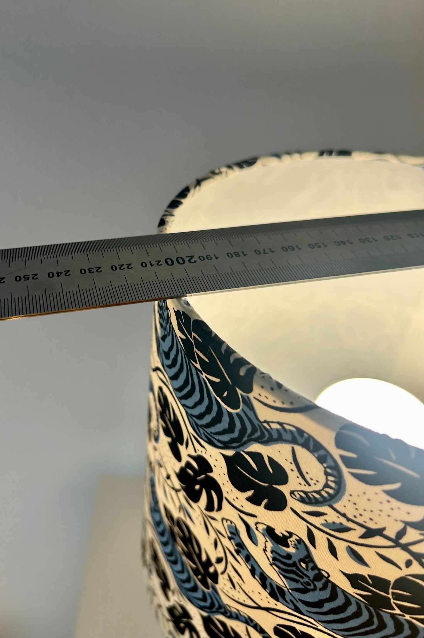 Cordless table lamp with shade made of Japanese tiger fabric