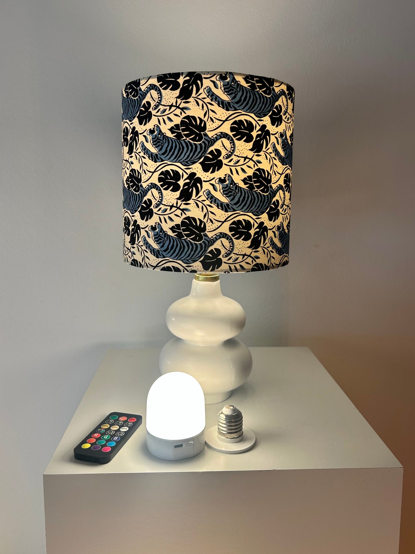 Cordless table lamp with shade made of Japanese tiger fabric