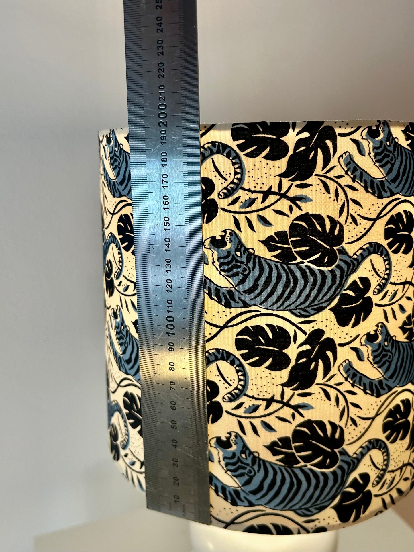 Cordless table lamp with shade made of Japanese tiger fabric